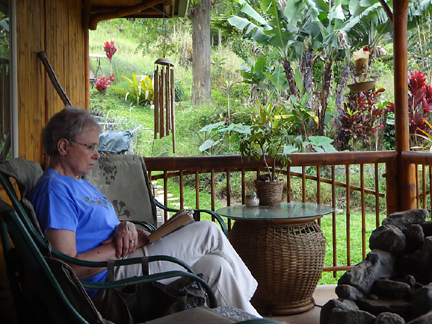 mom reading a book on the deck
